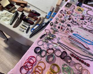 Bakelite bracelets, knives, leather wallets,
