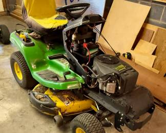 John Deere X300R lawn tractor with 1016 hours (hood missing)