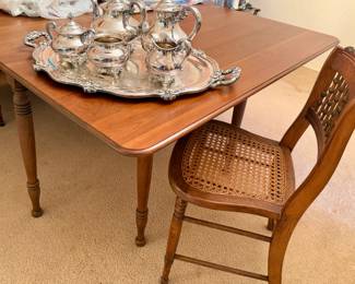 Pennsylvania House drop leaf dining table with 2 leaves and 6 rattan seat chairs