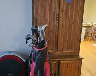 Golf clubs, gun cabinet