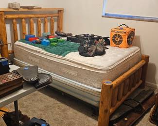 Amish made bed. Can fit side-by-side with the other bed to create a King-Plus! Hunting gear, gun cases