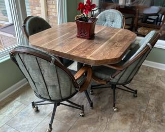 #87 laminate table with 4 rolling chairs 42x28 $125.00