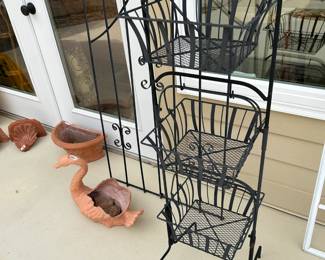 #233 3 metal basket stand 4 foot tall $30.00