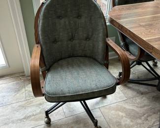 #87 laminate table with 4 rolling chairs 42x28 $125.00