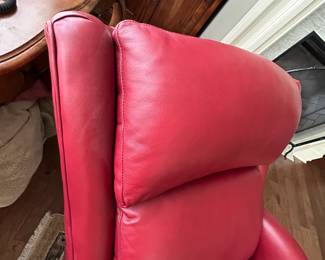 #59 red leather swivel electric recliner with adj head from Story and lee $850.00