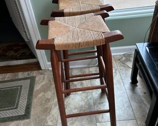 #99 pair of wood and rushing seat bar stools 30 tall $40.00