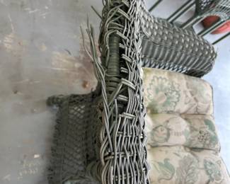 #103 green plastic wicker chair with cushion as is finish $40.00
