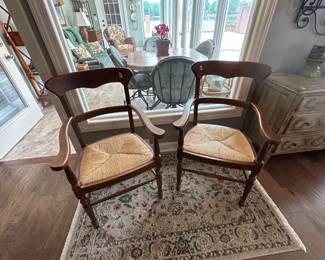 #64 2 odd dining chairs with rushing seat $150.00