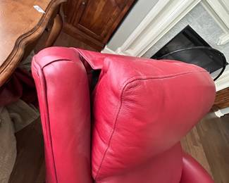 #59 red leather swivel electric recliner with adj head from Story and lee $850.00