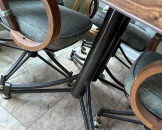 #87 laminate table with 4 rolling chairs 42x28 $125.00