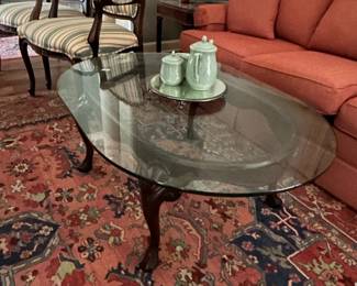 #42 glass top wood base coffee table 46 $75.00 #37 104x145 coral machine made rug with blue $150.00