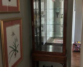 #46 century display cabinet with 1Beveled glass door 3 glass shelves 26x12x78 $300.00