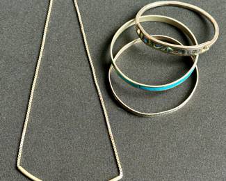 Silver bangles and necklace