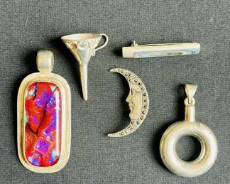 Sterling silver pendant (L), perfume funnel, moon and vertical pendant, and perfume flacon pendant (R)