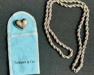 Tiffany and Co. sterling silver heart pendant (L) and 24" sterling silver and gold rope necklace
