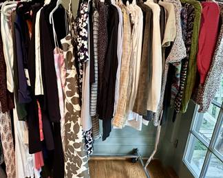 Sale inclues four racks on high-end women's clothing