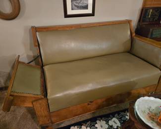 Antique Psychiatrist couch with fold down arms