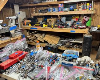 more handtools and POWER TOOLS on shelf behind!
