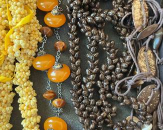 Fine selection of vintage jewelry, including this interesting amber necklace.