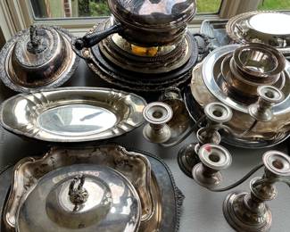 Large selection of vintage silverplate bowls, candlesticks, platters, and more.