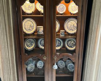 One of two impressive display cases/cabinets housing collections of Chinese Canton ware/porcelain, and Japanese Imari ware.