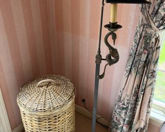 Antique floor lamp with swan motif.