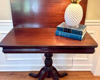 $200. Vintage flip top table. 34 x 16 (as shown) x 30H.