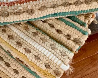$80. Set of 8 woven, rectangular placemats.