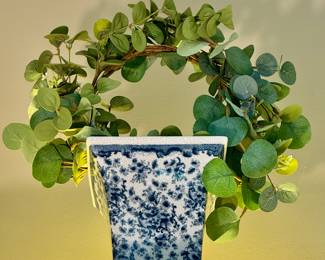$100/each. TWO avail. Winword ceramic planter with faux greenery.