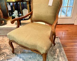 $450. Wooden armchair, custom upholstered. Twisted wood front frame. Lattke back. 29 x 25 x 41H. Very good condition!