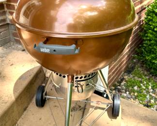 $80. Copper color, classic Weber grill. Cover included.
