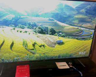 55 TCL Television Set And Brookstone Sound Bar