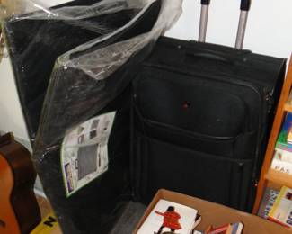 New Portfolios off the the side, Suitcase
