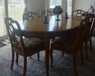 French Provincial dining Room set includes 2 leafs and protective pads for the table top, chairs recently re-upholstered in an appropriate style