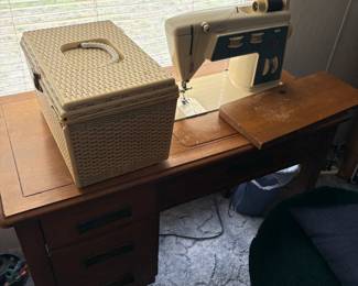 Singer sewing machine (folds into the desk with cover)