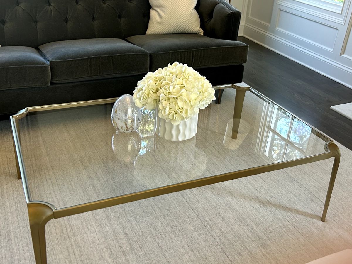 Baker Glass and Brass Coffee Table 54 W x 34 D x 16 H $750
