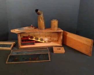 Antique magic lantern with glass slides