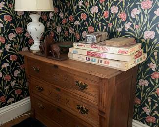 Eastlake Dresser, old games and lamp