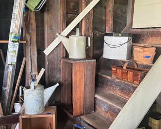 More garage including watering cans