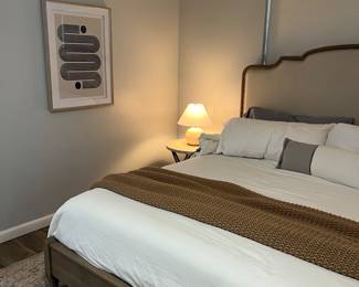 Primary suite art and nightstand