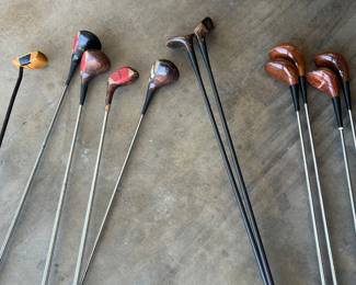 Vintage wooden golf clubs.