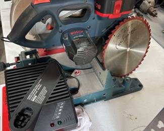 Bosch 10” cordless Chop Saw, charger, battery, xtra blade. $320.00