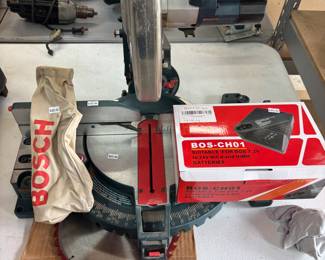 Bosch 10” cordless Chop Saw, charger, battery, xtra blade. $320.00