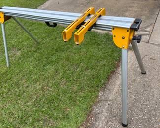 DeWalt Universal Mitre Saw Stand Adjustable. Fits other saws w 4 hole base 70”- 13’w 28”d 32”t. $ 150.00