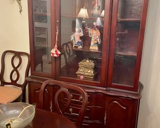 Beautiful wood and glass China Cabinet with Chinese figurines