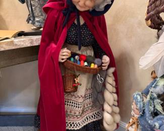 "The Peddler" by Sara Baker doll on stand
