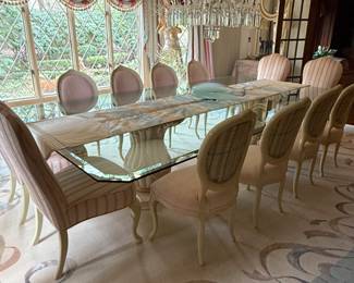 Fabulous decorator glass top dining table with 12 chairs
