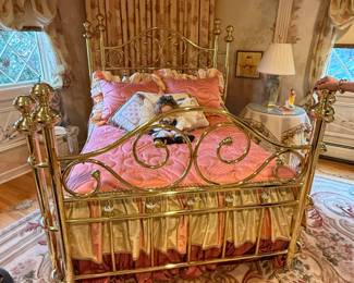 Full size brass bed, linens and rug all perfect match