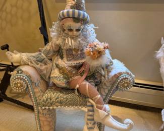Lynn West seated harlequin