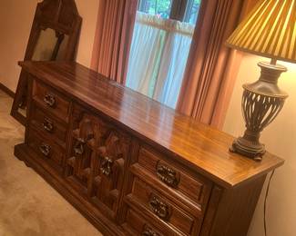 antique dresser, drawers in center cabinets